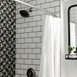 white shower curtain on stainless steel shower head
